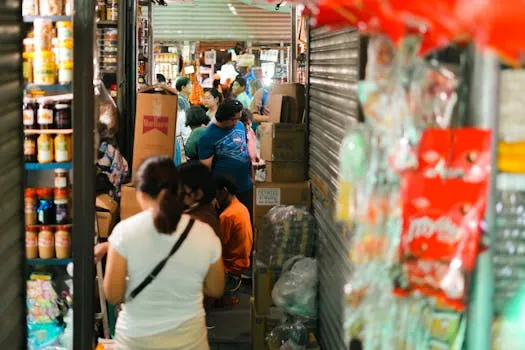 While low-income consumers struggle with rising gas prices, higher earners grow nervous as markets fall